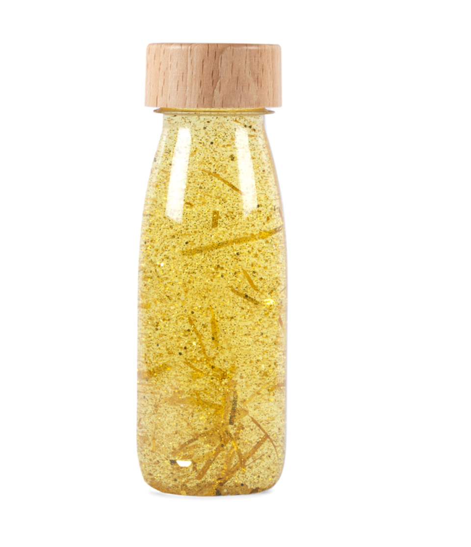 Botella sensorial dorada