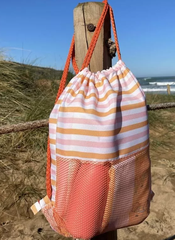 Mochila saco antiarena Coral & Mostaza
